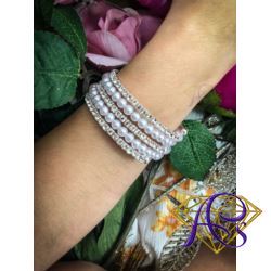 Elegancka bransoleta z perełkami i kryształkami